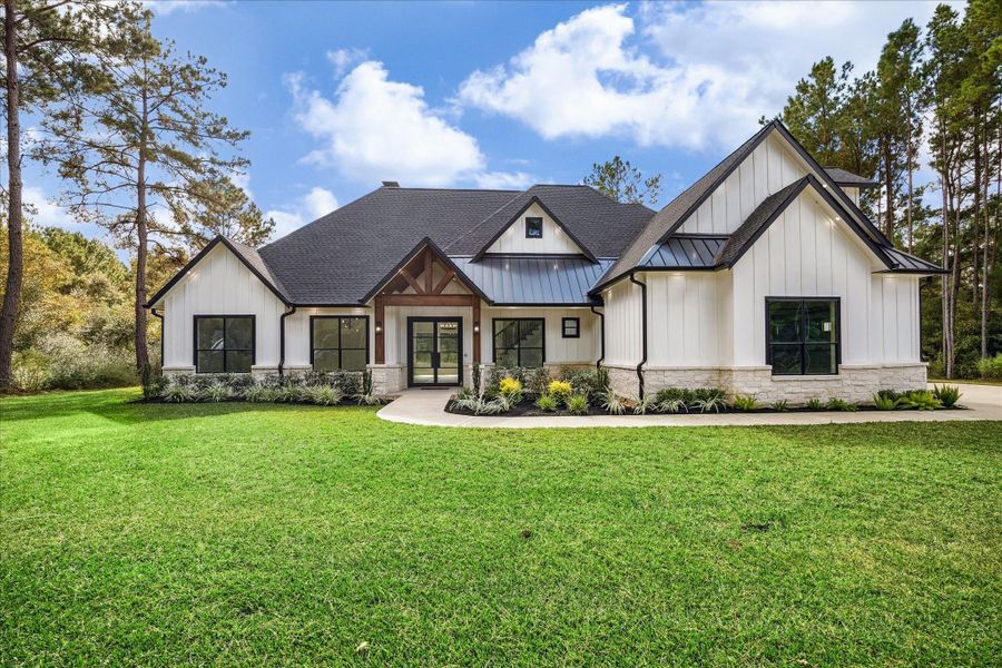 Front exterior of a new home in , Waller, TX, highlighting curb appeal (Image 24).