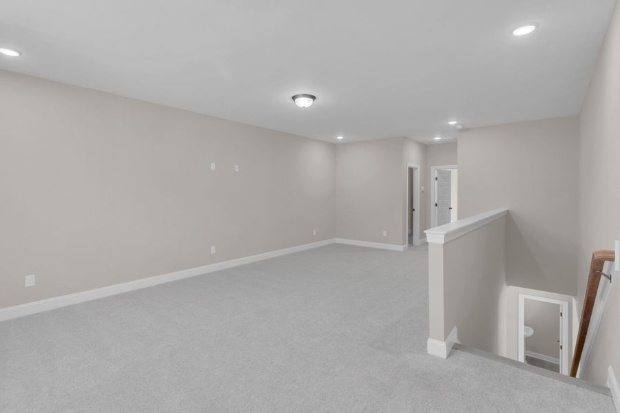 Representative unfurnished interior of a home built from the The Bradley by RobuckHomes in Windwater, Hampstead (Image 66).