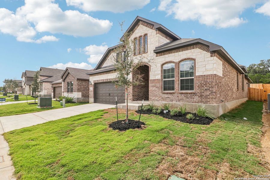 Exterior details and patio area of a home in Fox Falls, Boerne (Image 23).