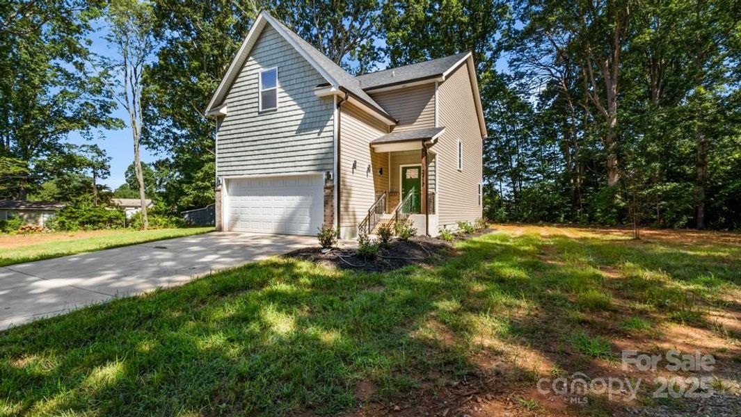 Front exterior of a new home in , Kernersville, NC, highlighting curb appeal (Image 20).