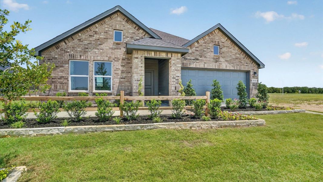 Representative exterior photo of a completed home built from the Texas Cali by D.R. Horton in Saratoga, Granbury, TX (Image 22).