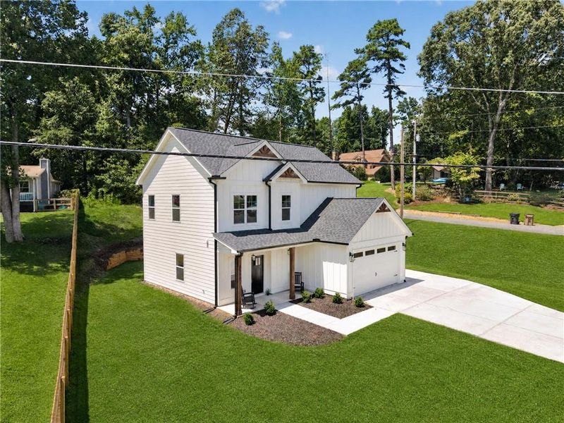Front exterior of a new home in , Cumming, GA, highlighting curb appeal (Image 33).