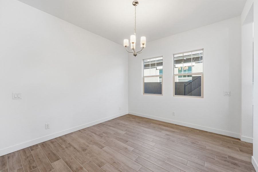 Spacious, unfurnished interior of a new home in Ellsworth Ranch, Queen Creek (Image 22).