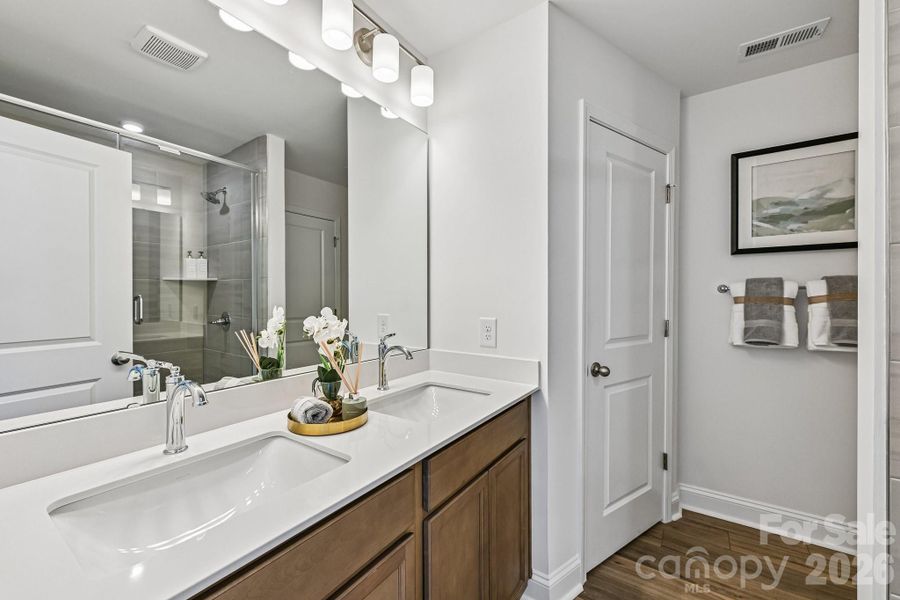 Model Home - Owner's Bath with Water Closet & Linen Closet. Model Home - Owner's Bath with Water Closet & Linen Closet.