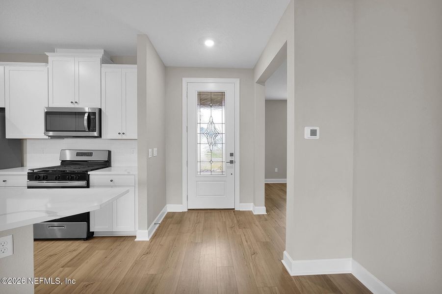 Furnished interior view inside a new home in Jennings Farm, Middleburg (Image 8).