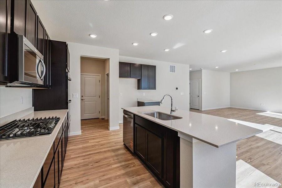 Furnished interior view inside a new home in Floret Collection at Alder Creek, Parker (Image 11).