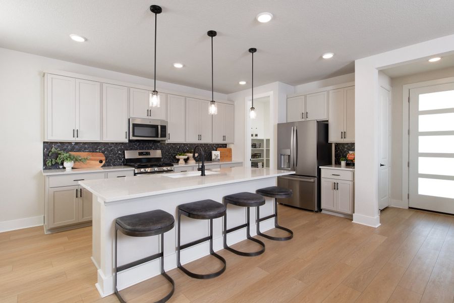 Representative furnished interior of a home built from the Chicory by Tri Pointe Homes in The Retreat at Harvest, Argyle (Image 8).