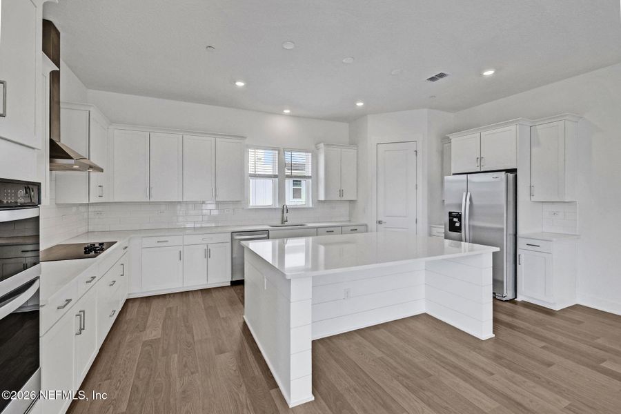 Furnished interior view inside a new home in North Beach Townhomes, Jacksonville Beach (Image 7).