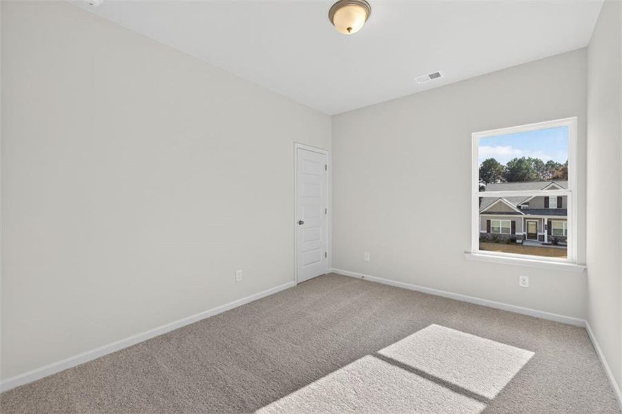 Spacious, unfurnished interior of a new home in Garrett Preserve, Douglasville (Image 28).