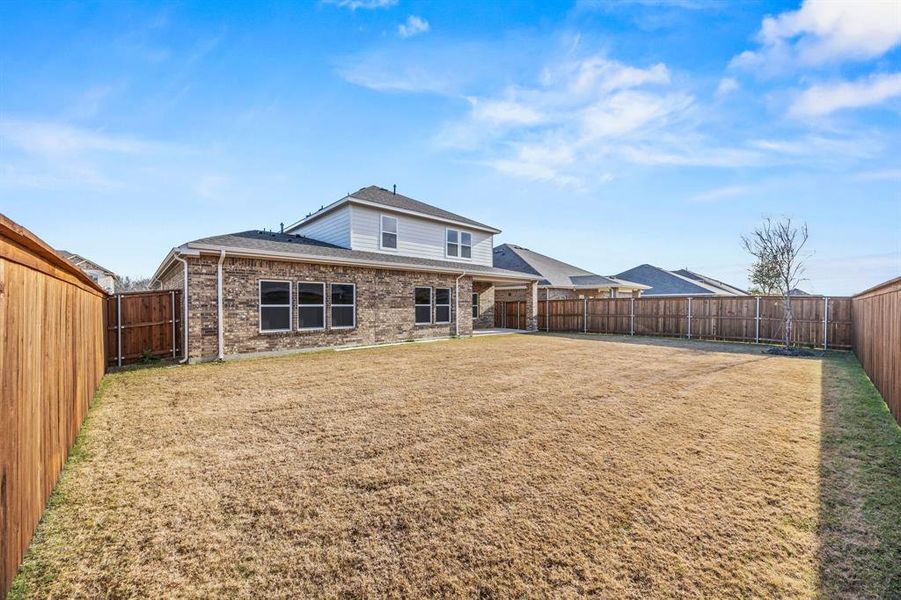 Exterior details and patio area of a home in Overland Grove, Heath (Image 4).