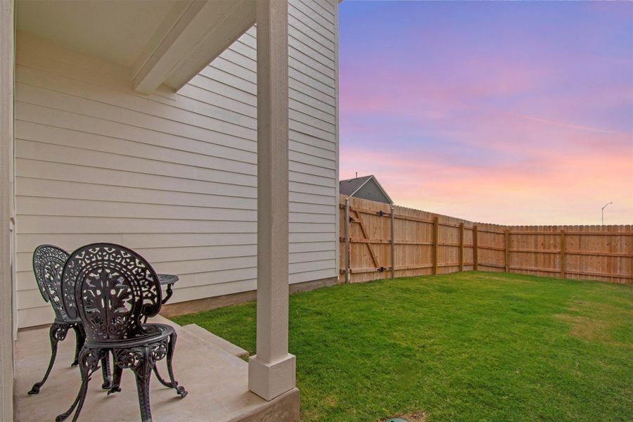 Exterior details and patio area of a home in The Cottages at Lariat, Liberty Hill (Image 2).