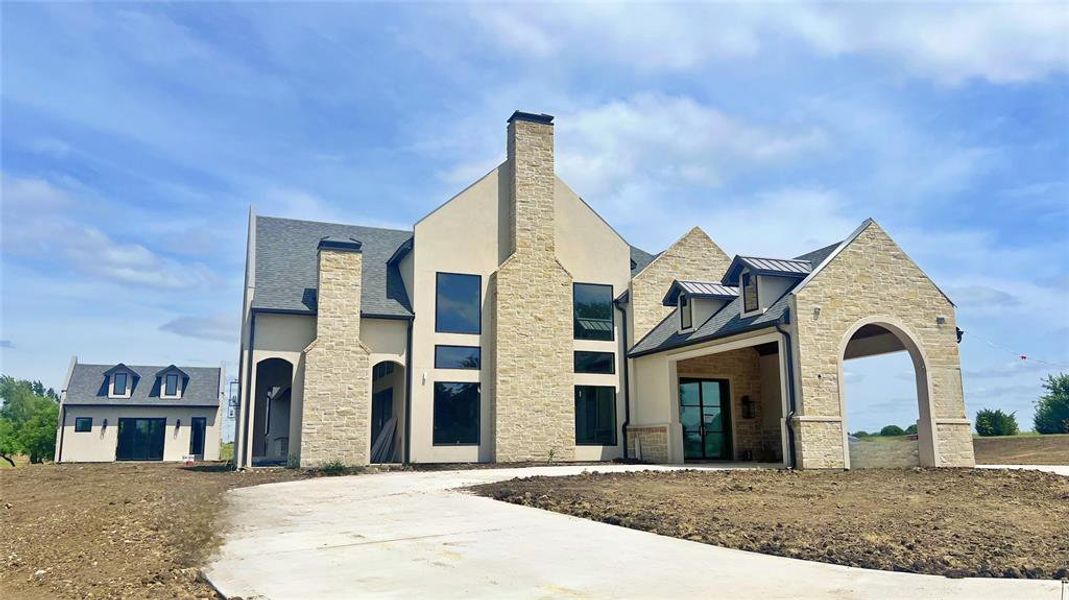 Front exterior of a new home in , Weston, TX, highlighting curb appeal (Image 14).
