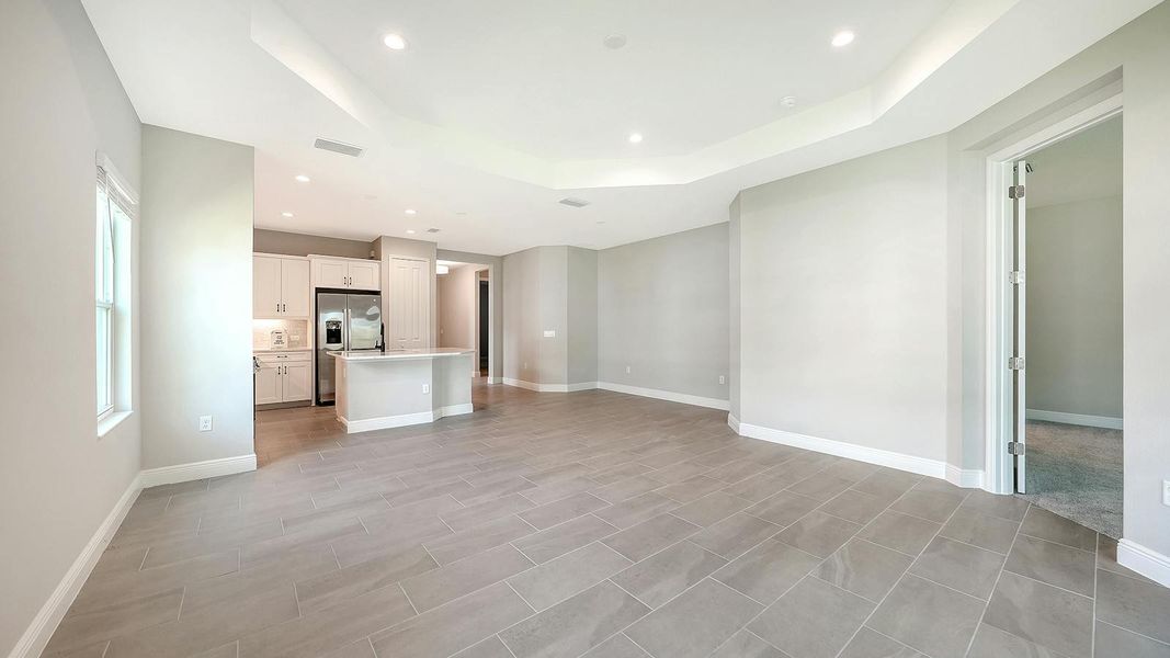 Spacious, unfurnished interior of a new home in Wildleaf Real Estate and Homes for Sale in Parrish, FL - Neal Communities, Parrish (Image 16).