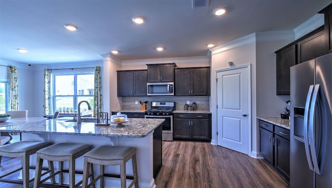 Furnished interior view inside a new home in Reserve at Tap Root Farms, Fletcher (Image 9). Furnished interior view inside a new home in Reserve at Tap Root Farms, Fletcher (Image 9).