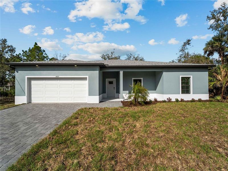 Exterior details and patio area of a home in , North Port (Image 31).