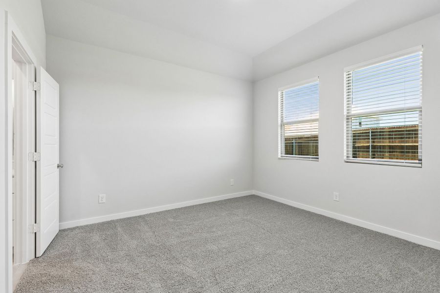Primary Suite in the Cypress home plan by Trophy Signature Homes - REPRESENTATIVE PHOTO
