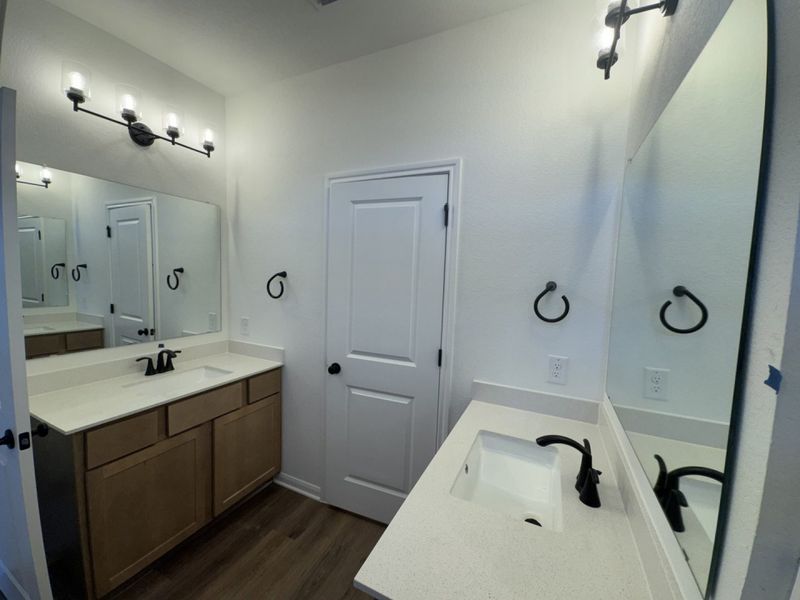 Furnished interior view inside a new home in Village at Three Oaks, Seguin (Image 7).