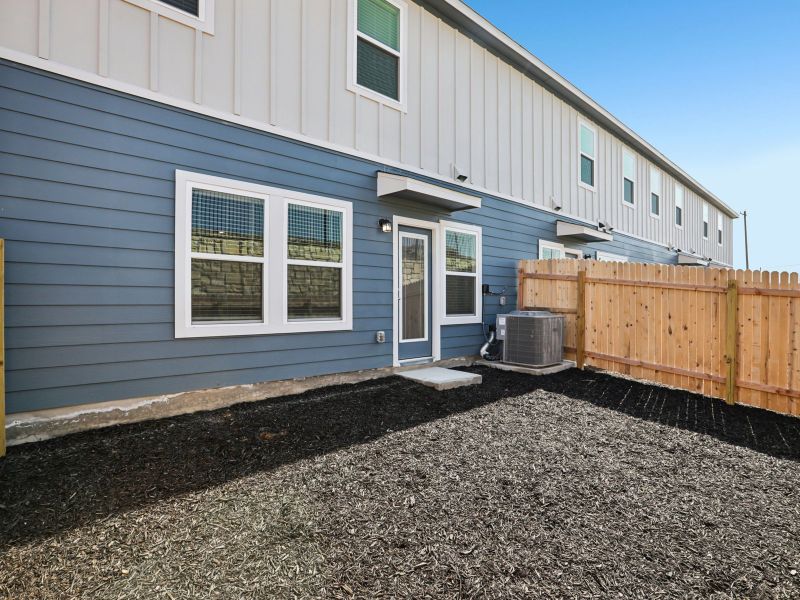 Exterior details and patio area of a home in Turner's Village, Buda (Image 2). Exterior details and patio area of a home in Turner's Village, Buda (Image 2).