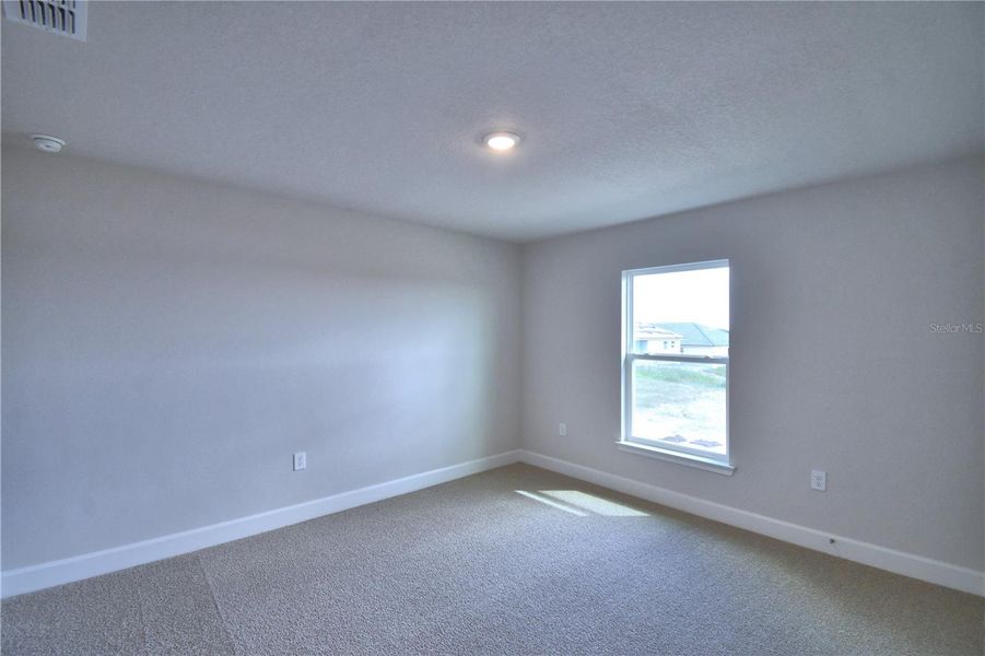 Spacious, unfurnished interior of a new home in Lake Juliana Estates, Auburndale (Image 26).