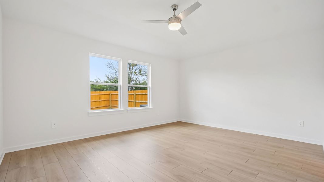 Spacious, unfurnished interior of a new home in Trails at Wildhorse, Austin (Image 24).