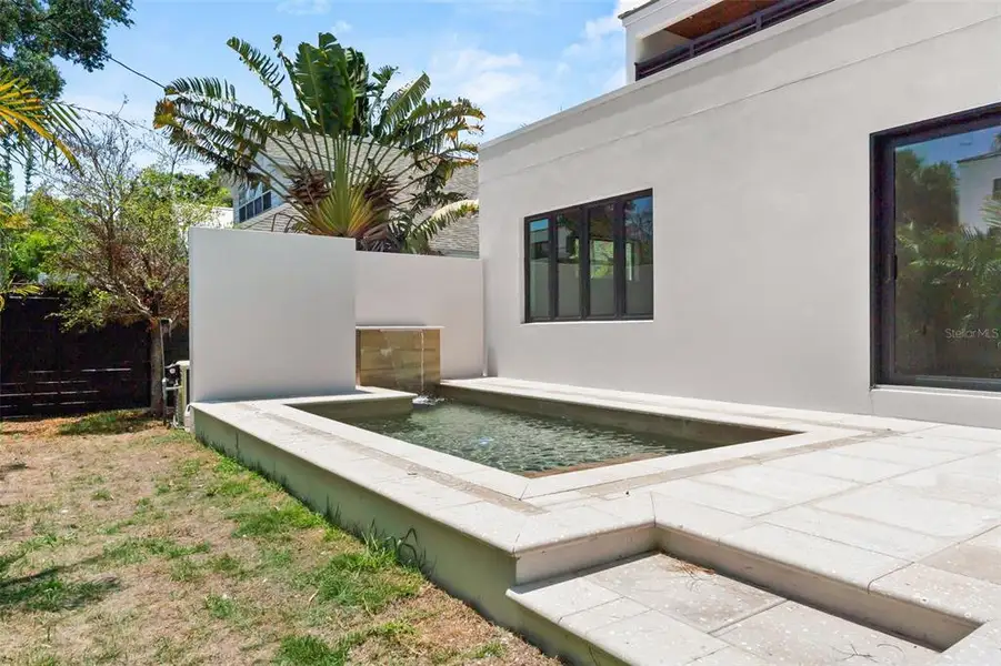 Exterior details and patio area of a home in , Sarasota (Image 34).