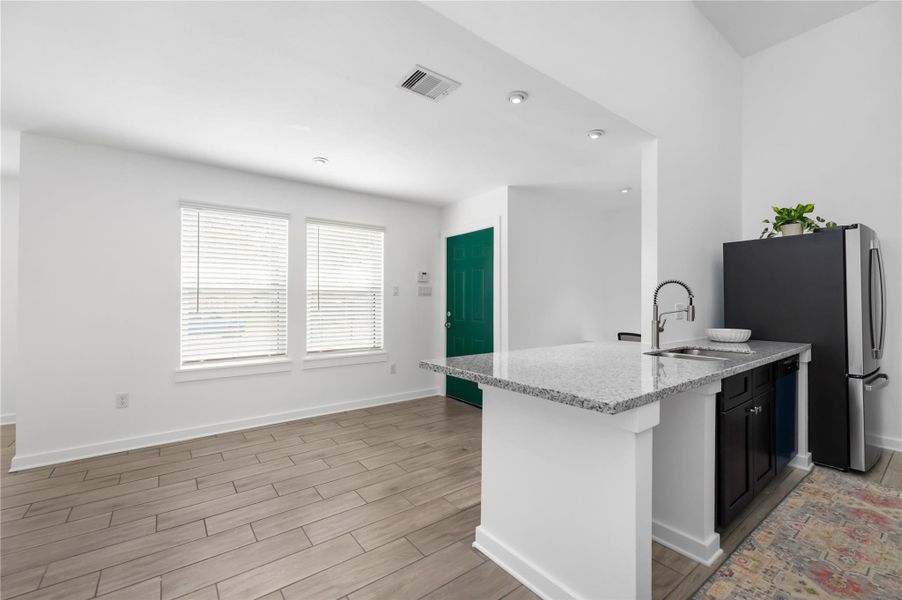 Unit B Kitchen and Entry Unit B Kitchen and Entry