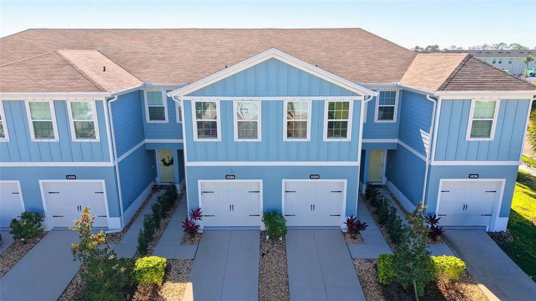 Front exterior of a new home in , Bradenton, FL, highlighting curb appeal (Image 26).
