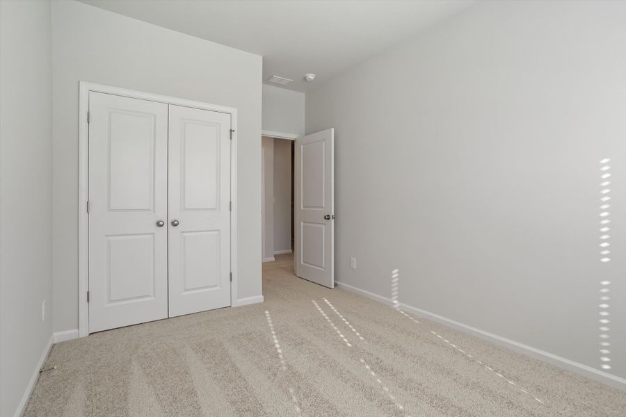 Spacious, unfurnished interior of a new home in West Main Townhomes, Sanford (Image 25).
