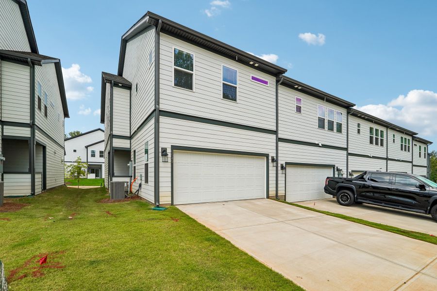 Exterior details and patio area of a home in Terraces at the Exchange, Indian Land (Image 4).
