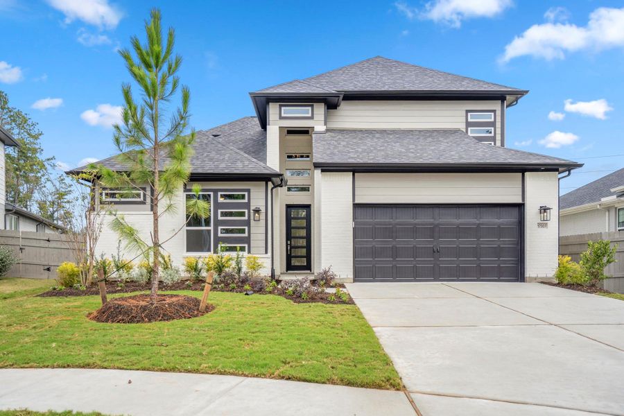 Front exterior of a new home in Artavia, Conroe, TX, highlighting curb appeal (Image 28). Front exterior of a new home in Artavia, Conroe, TX, highlighting curb appeal (Image 28).