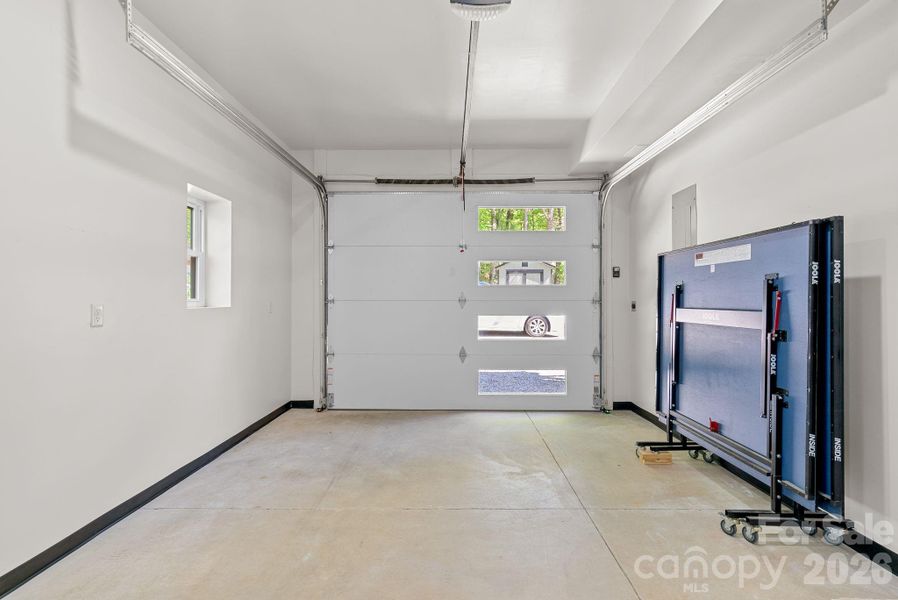 Lower level garage could be used as incredible flex space - it is heated / cooled and ready for your imagination.