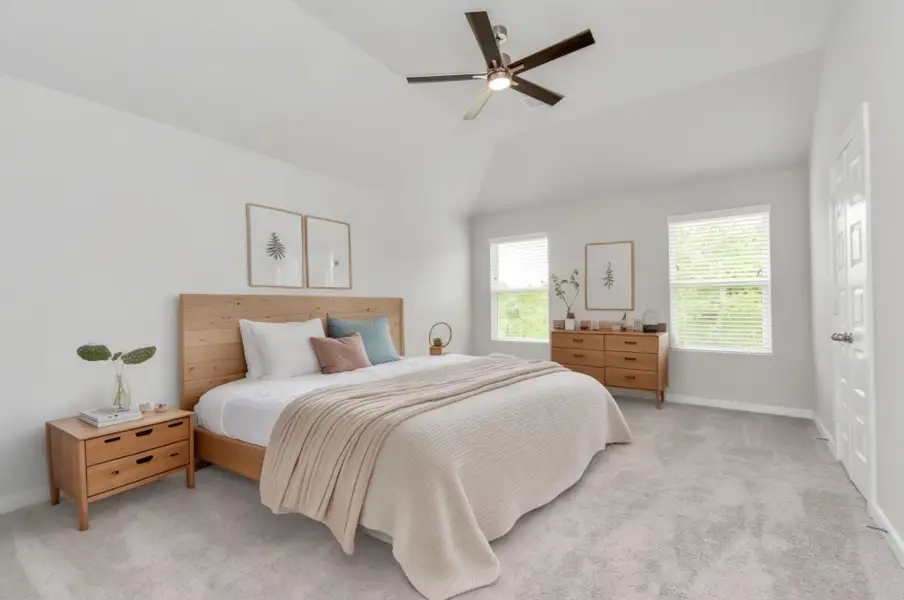 Virtually Staged - Primary Bedroom. Sample photo of completed home with similar floor plan. Actual colors and selections may vary. Virtually Staged - Primary Bedroom. Sample photo of completed home with similar floor plan. Actual colors and selections may vary.