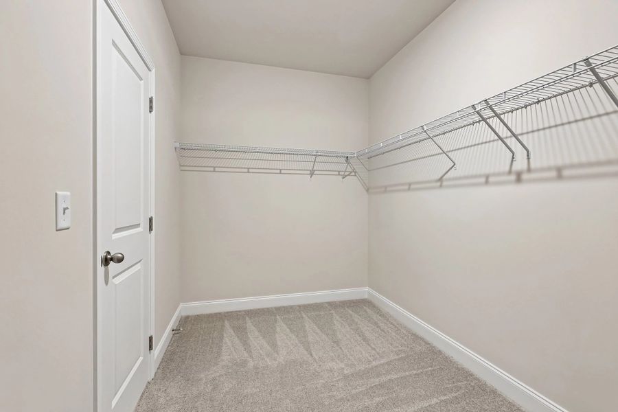 Primary Walk-in Closet Primary Walk-in Closet