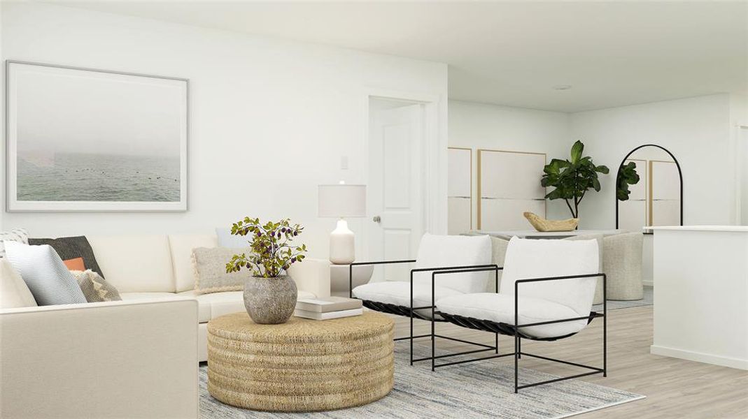 Living room with light hardwood / wood-style flooring