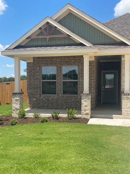 View of front of home with a front yard