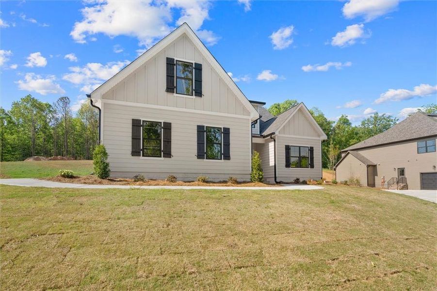 Front exterior of a new home in , Carrollton, GA, highlighting curb appeal (Image 1). Front exterior of a new home in , Carrollton, GA, highlighting curb appeal (Image 1).