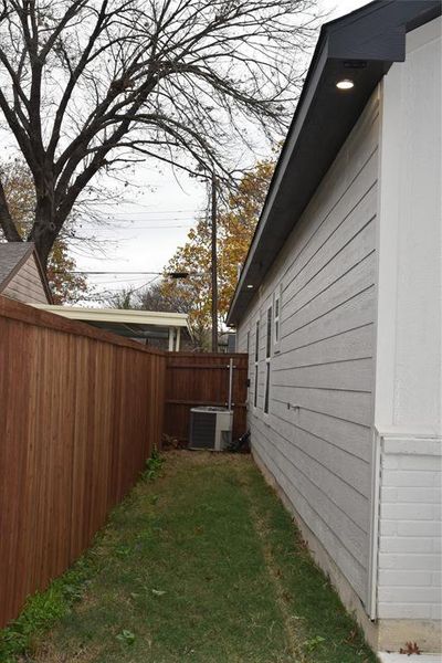 View of yard with central air condition unit