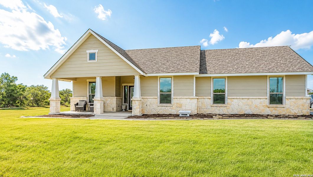 Exterior details and patio area of a home in , Devine (Image 18).