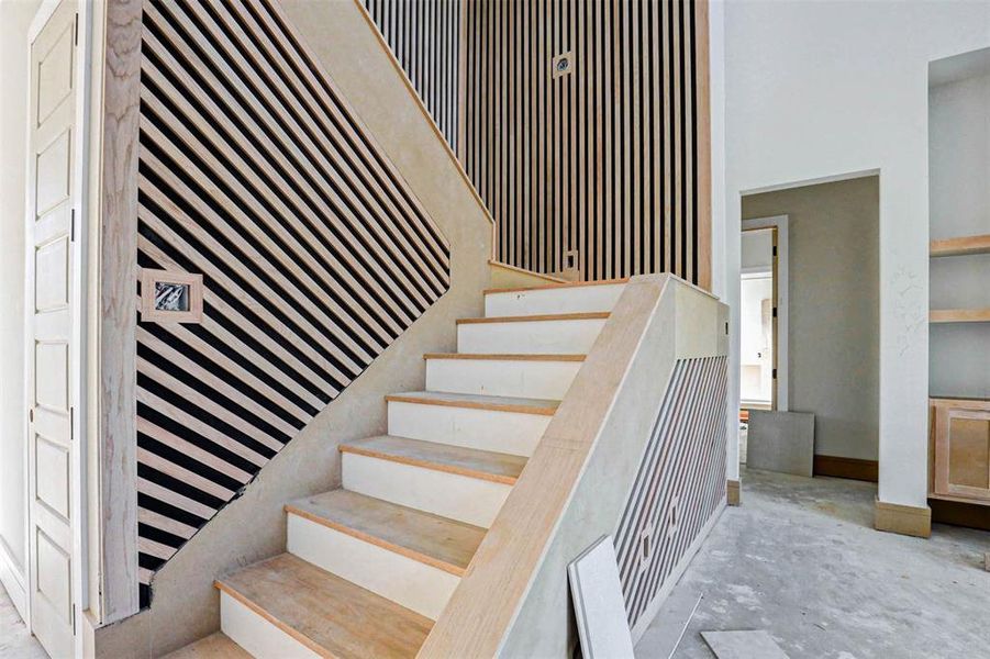 Stairs with concrete flooring