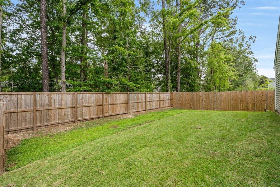 Exterior details and patio area of a home in Six Oaks, Summerville (Image 4).