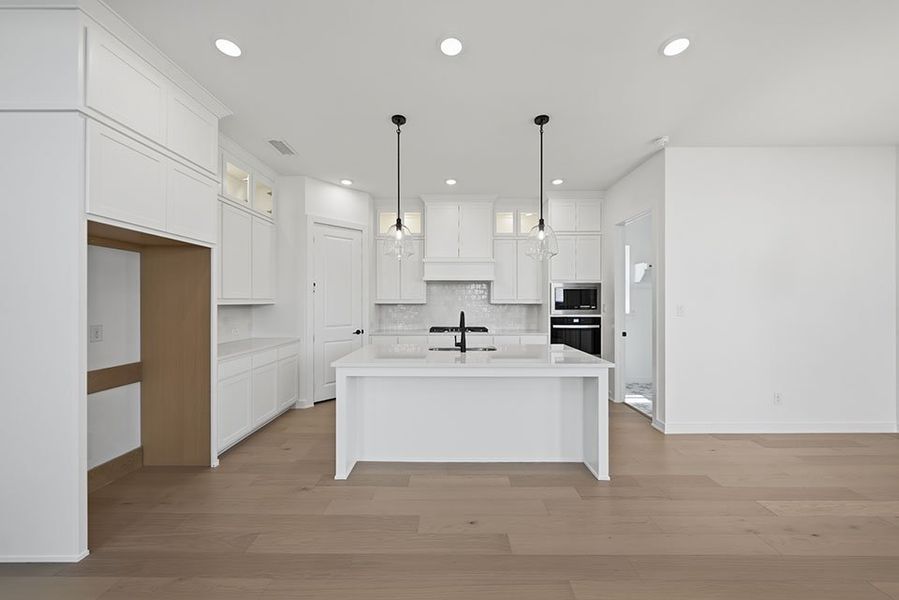 Furnished interior view inside a new home in Light Farms Brenham - 40' Lots, Celina (Image 9).