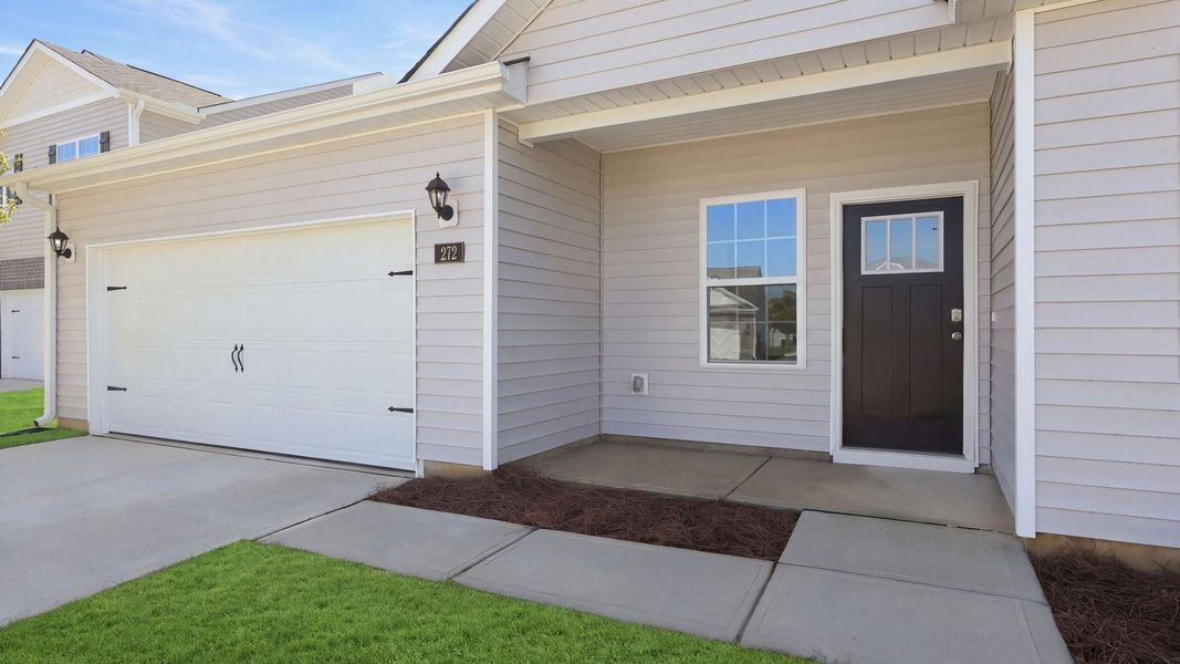 Exterior details and patio area of a home in Tyler - Home on the Lake, New Bern (Image 4).