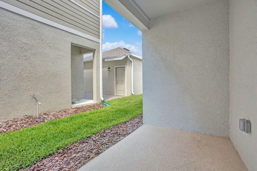 Exterior details and patio area of a home in Wellness Ridge, Clermont (Image 4).