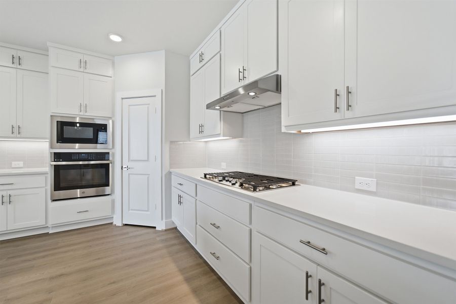 Furnished interior view inside a new home in Santa Rita Ranch, Liberty Hill (Image 11).