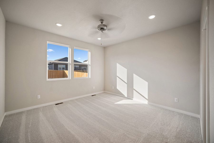 Spacious, unfurnished interior of a new home in The Glen, Colorado Springs (Image 25).