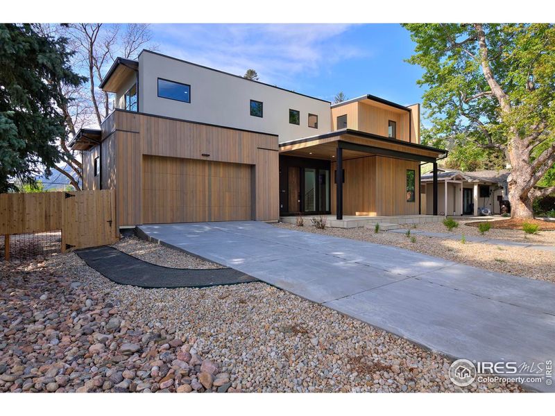 Front exterior of a new home in , Boulder, CO, highlighting curb appeal (Image 15).