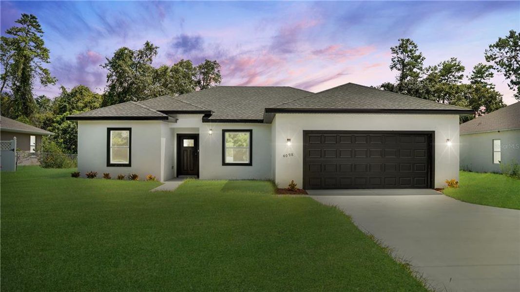 Front exterior of a new home in , Ocala, FL, highlighting curb appeal (Image 2). Front exterior of a new home in , Ocala, FL, highlighting curb appeal (Image 2).