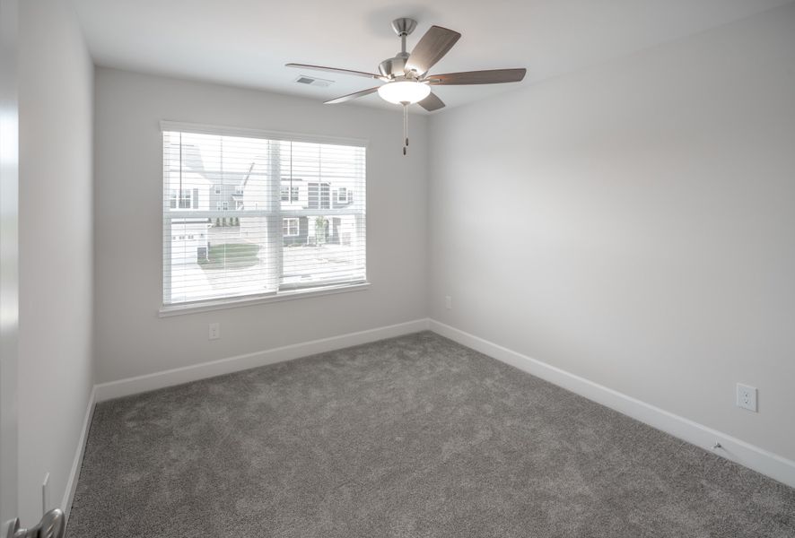 Representative unfurnished interior of a home built from the The Holland by Cothran Homes in Holly Ridge, Greenville (Image 37).