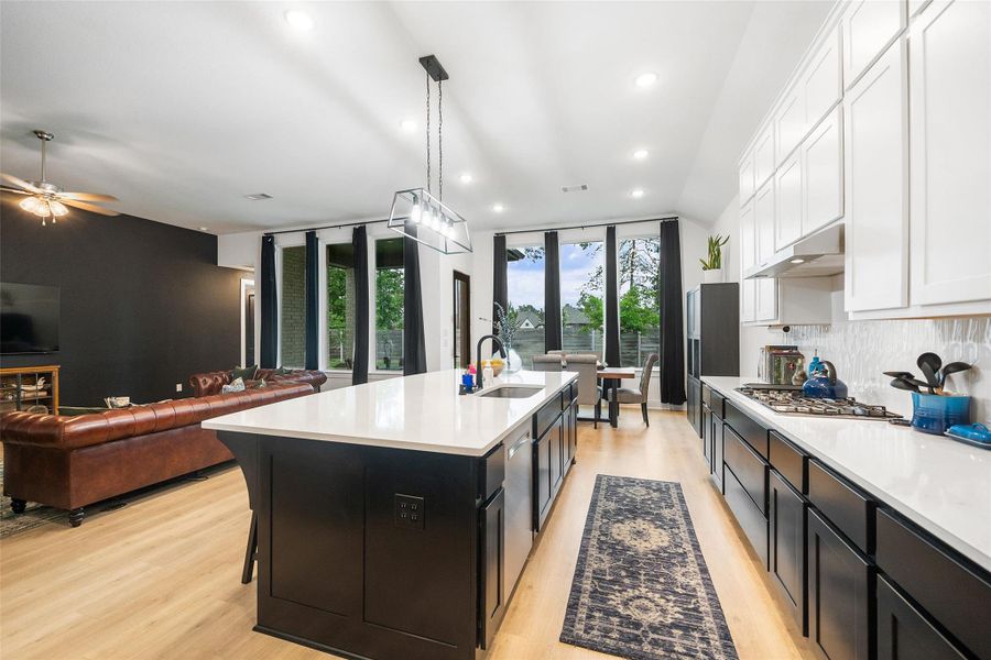 Beautiful view of Kitchen - Breakfast Bar - Dining Area - Family Room. Imagine all the natural lighting!