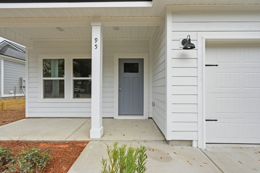 Exterior details and patio area of a home in Live Oak Cottages, Freeport (Image 3). Exterior details and patio area of a home in Live Oak Cottages, Freeport (Image 3).